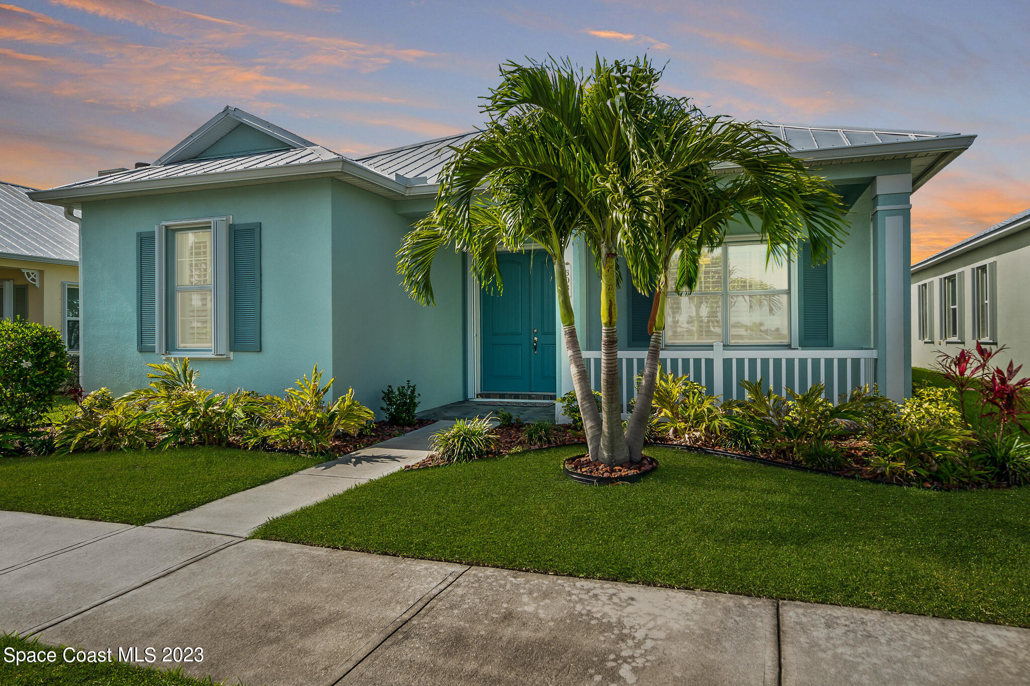 603 Heming Way Melbourne, FL 32901 - Photo 1 of 45 a front view of a house with garden