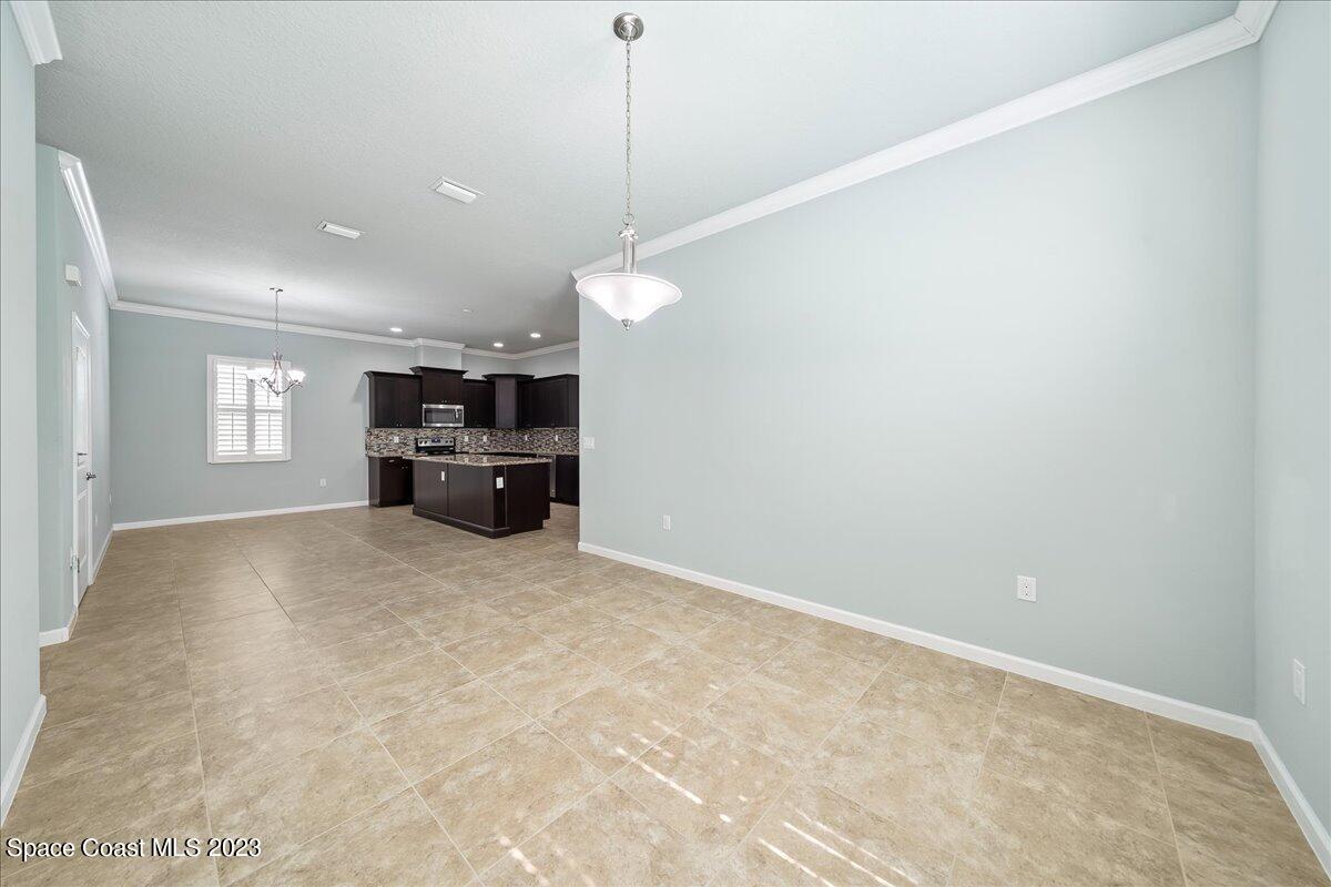 603 Heming Way Melbourne, FL 32901 - Photo 22 of 45 a view of a room with furniture and window