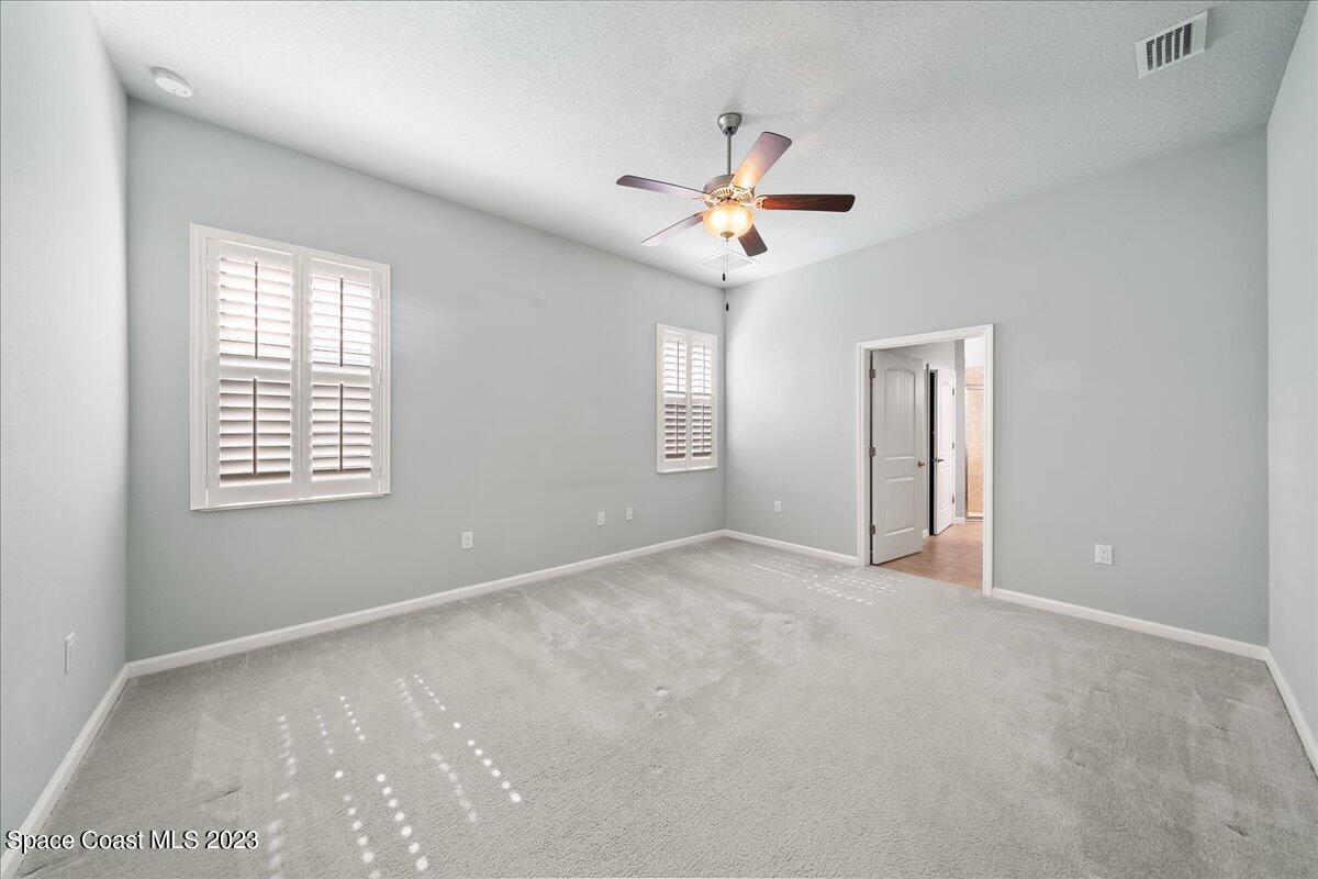 603 Heming Way Melbourne, FL 32901 - Photo 24 of 45 a view of an empty room with a window