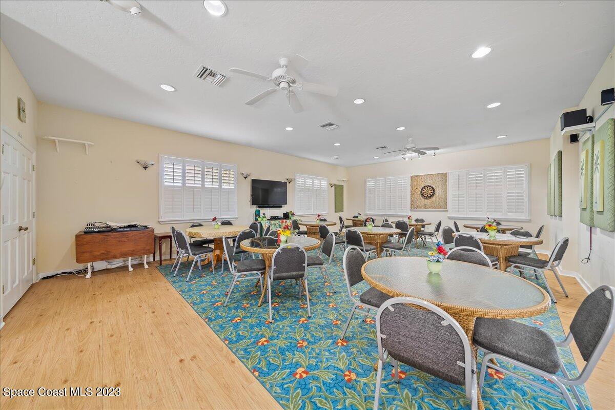 603 Heming Way Melbourne, FL 32901 - Photo 38 of 45 a living room with furniture a rug and a window