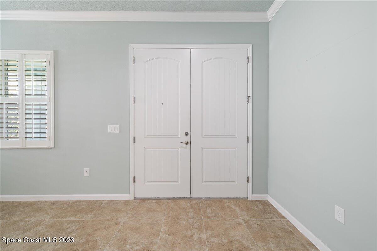 603 Heming Way Melbourne, FL 32901 - Photo 6 of 45 an empty room with windows