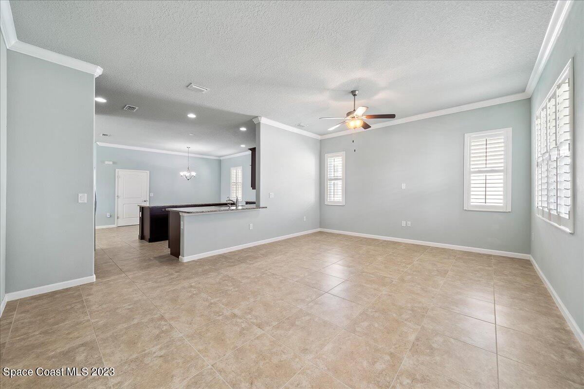 603 Heming Way Melbourne, FL 32901 - Photo 7 of 45 a view of an empty room with a window