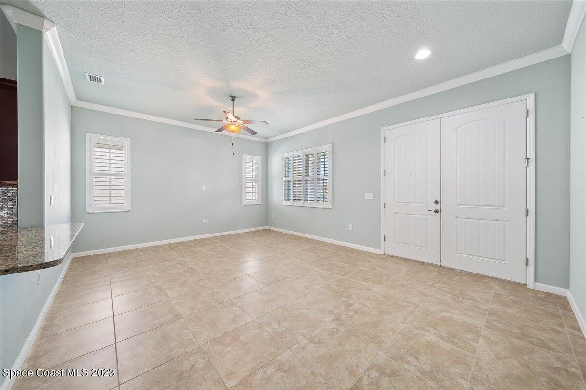 603 Heming Way Melbourne, FL 32901 - Photo 9 of 45 a view of an empty room with a window