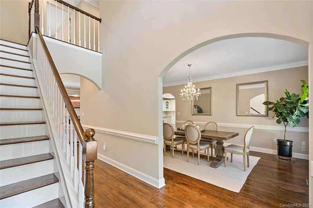 7915 Park Road Charlotte, NC 28210 - Photo 3 of 40 a view of dining room with furniture window and wooden floor