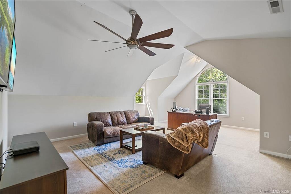 7915 Park Road Charlotte, NC 28210 - Photo 23 of 40 a living room with furniture and a window