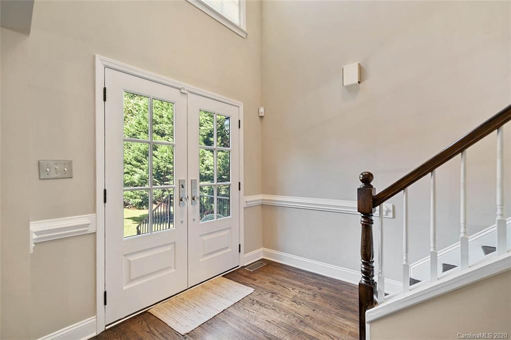 7915 Park Road Charlotte, NC 28210 - Photo 4 of 40 a view of an entryway with wooden floor