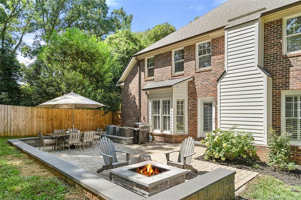 7915 Park Road Charlotte, NC 28210 - Photo 35 of 40 a view of a house with backyard and sitting area