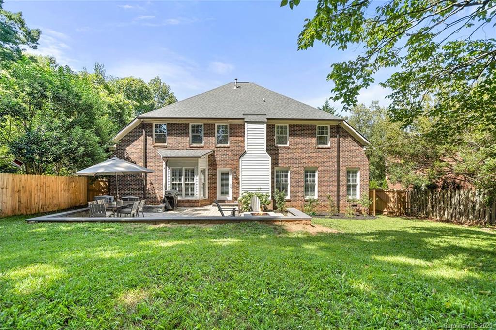 7915 Park Road Charlotte, NC 28210 - Photo 39 of 40 a front view of a house with garden