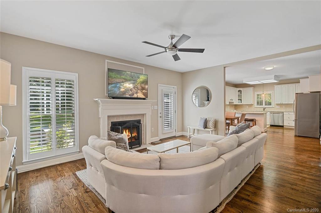 7915 Park Road Charlotte, NC 28210 - Photo 7 of 40 a living room with furniture and a fireplace