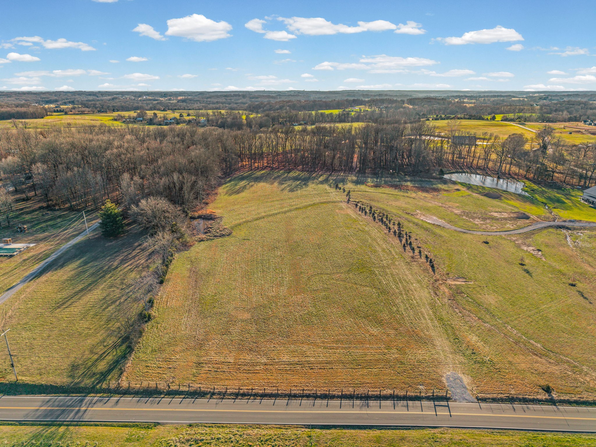 5790 Flewellyn Road Springfield, TN 37172 - Photo 11 of 18 a view of a swimming pool and an outdoor seating