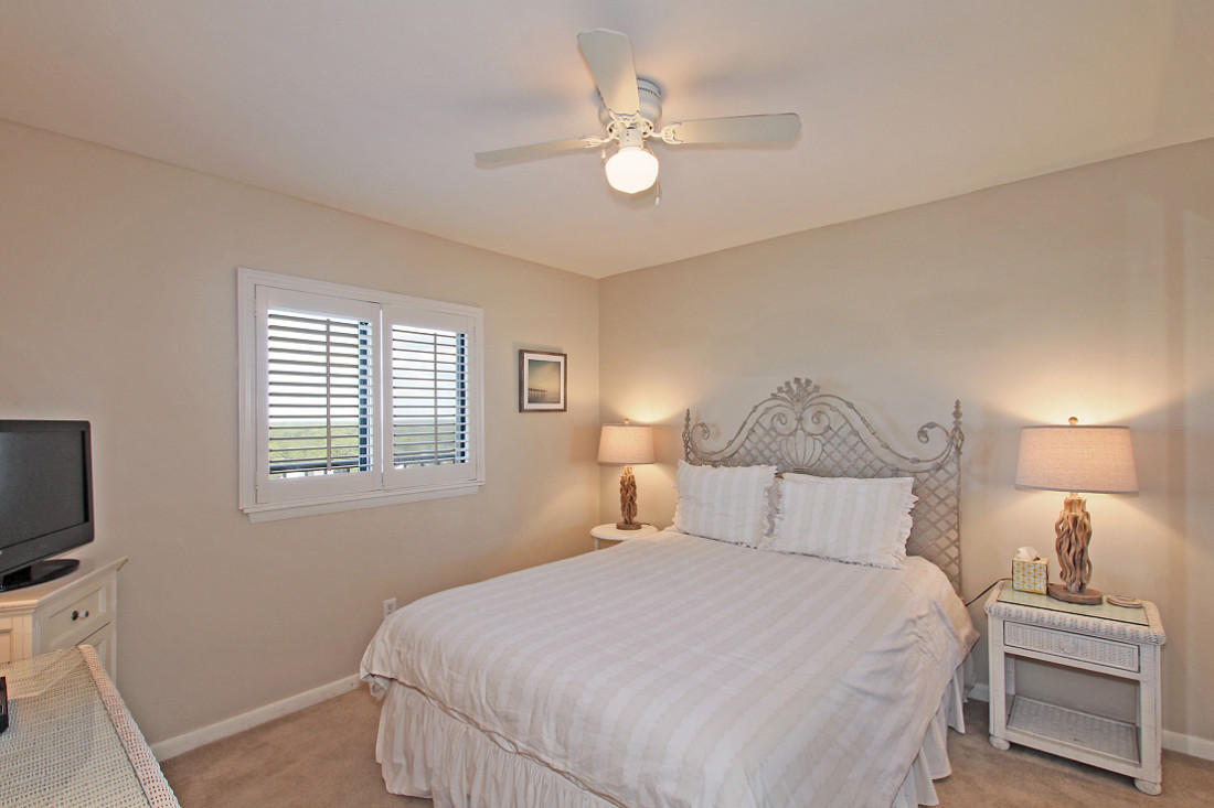 4100 East Scenic Highway, Unit 1307 Santa Rosa Beach, FL 32459 - Photo 15 of 28 a bedroom with a bed and a flat tv screen on the dresser
