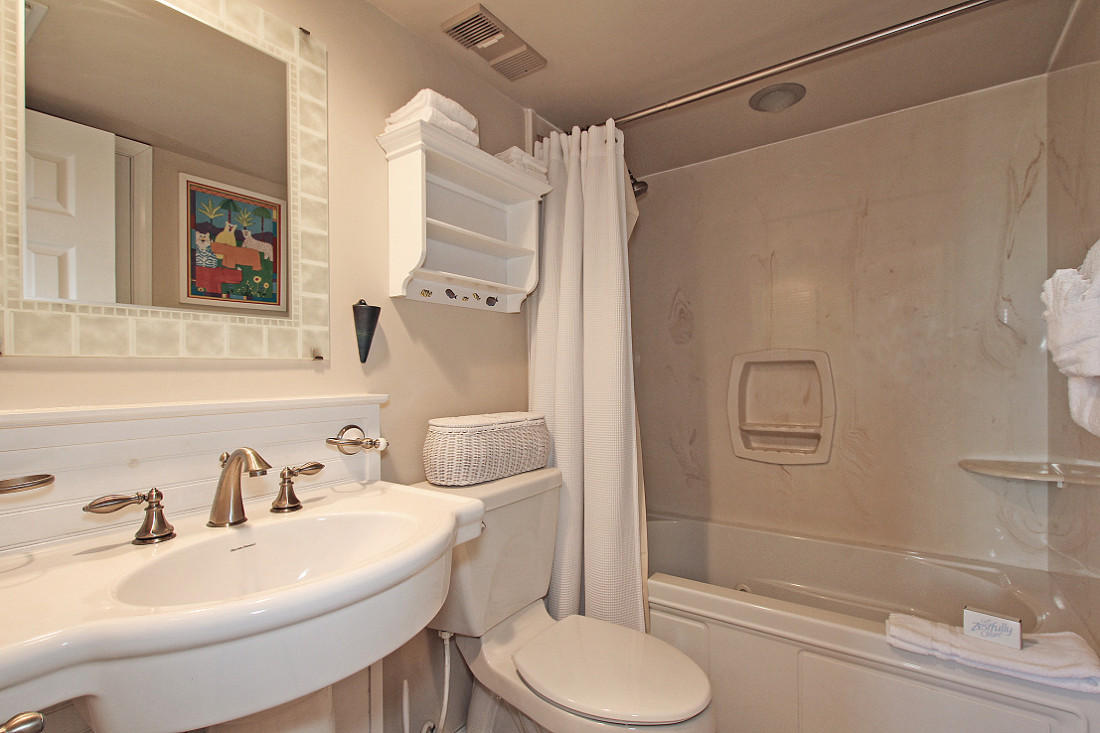 4100 East Scenic Highway, Unit 1307 Santa Rosa Beach, FL 32459 - Photo 17 of 28 a bathroom with a sink toilet and shower