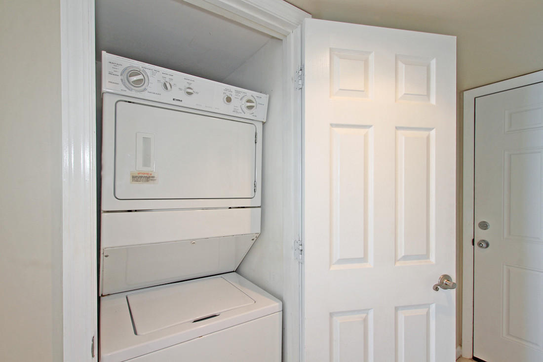 4100 East Scenic Highway, Unit 1307 Santa Rosa Beach, FL 32459 - Photo 18 of 28 a utility room with dryer and washer