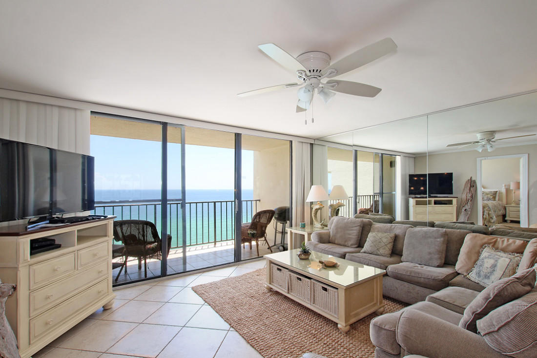 4100 East Scenic Highway, Unit 1307 Santa Rosa Beach, FL 32459 - Photo 3 of 28 a living room with furniture a flat screen tv and a large window