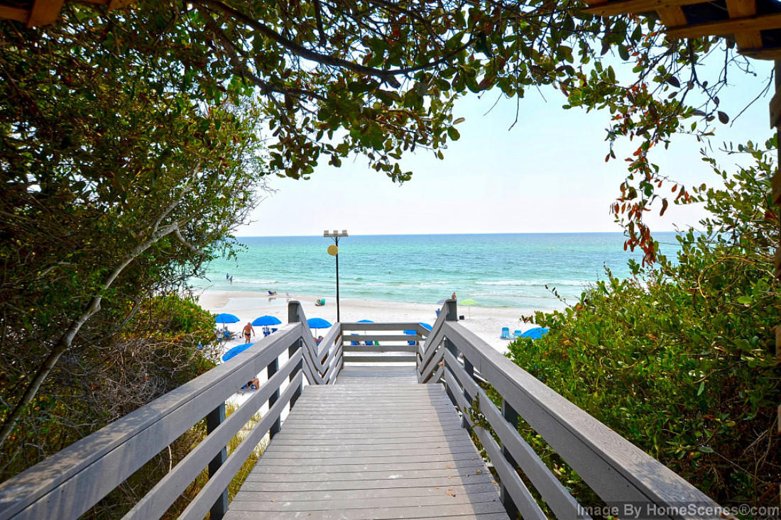 4100 East Scenic Highway, Unit 1307 Santa Rosa Beach, FL 32459 - Photo 25 of 28 a view of a balcony with wooden floor and fence