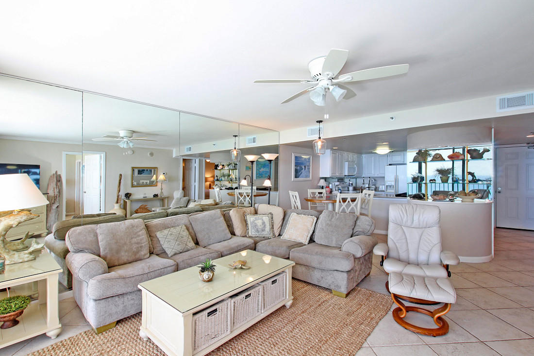 4100 East Scenic Highway, Unit 1307 Santa Rosa Beach, FL 32459 - Photo 5 of 28 a living room with furniture and a chandelier