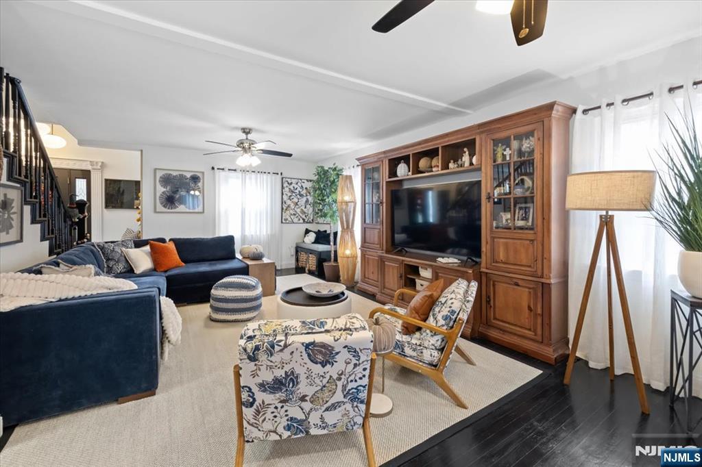 338 South Van Dien Avenue Ridgewood, NJ 07450 - Photo 12 of 33 a living room with furniture and a flat screen tv