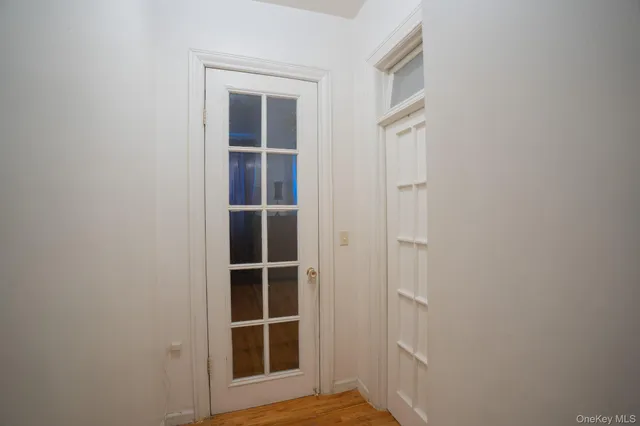 a view of empty room with windows
