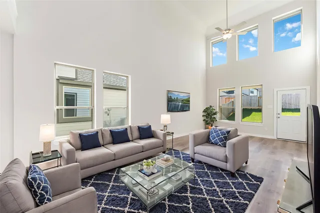 a kitchen with kitchen island granite countertop a sink and steel appliances