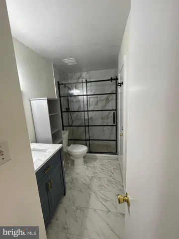 a bathroom with a sink and a toilet