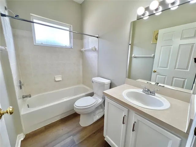 a bathroom with a sink toilet a shower and bathtub