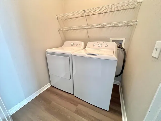 a utility room with dryer and washer