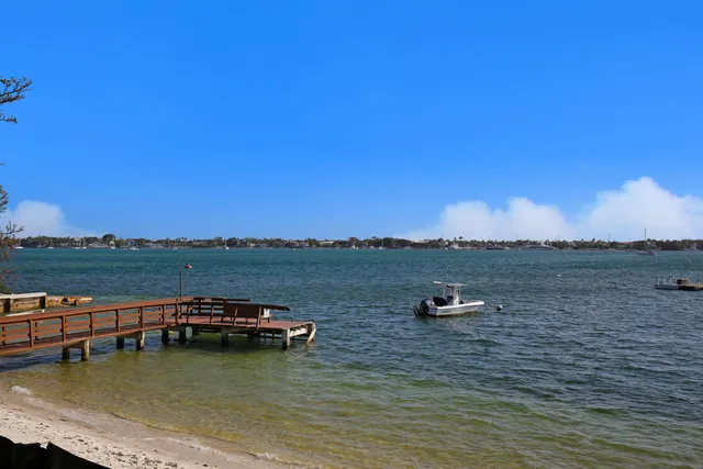 a view of a lake with mountain in the background