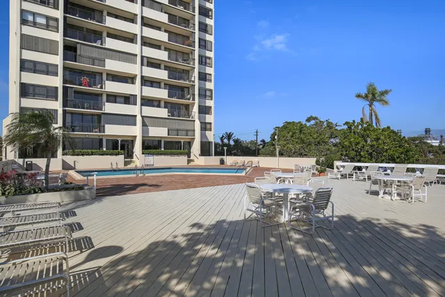 a view of a building with sitting area
