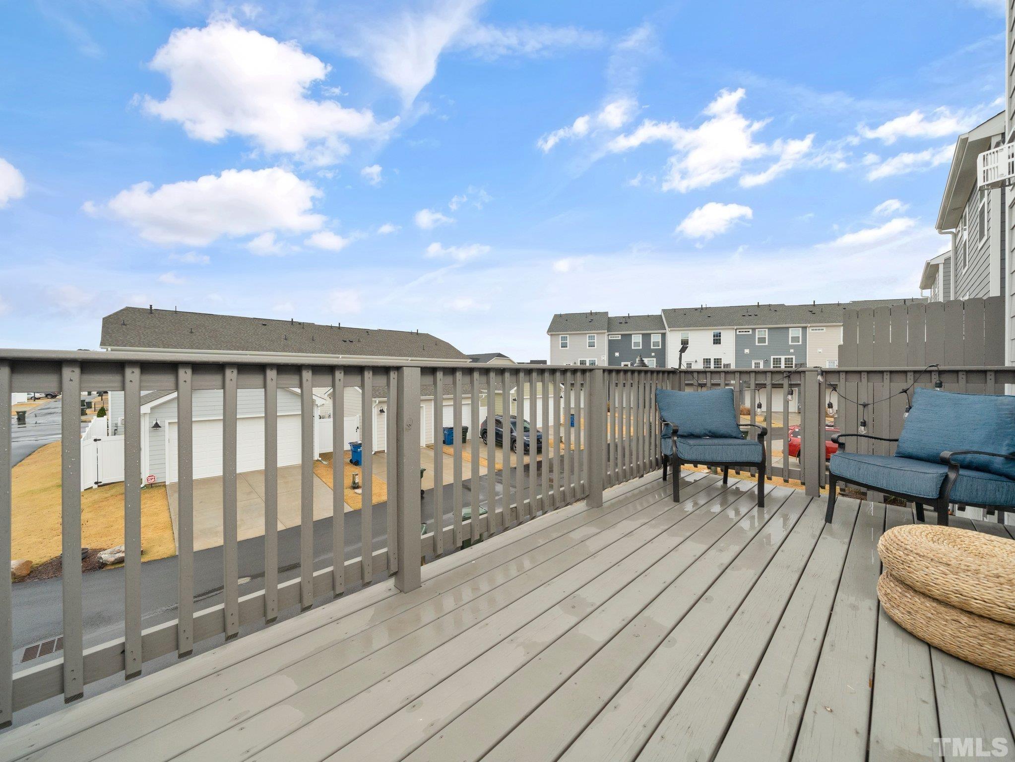 5915 Kayton Street Raleigh, NC 27616 - Photo 24 of 26 a view of a terrace with chairs