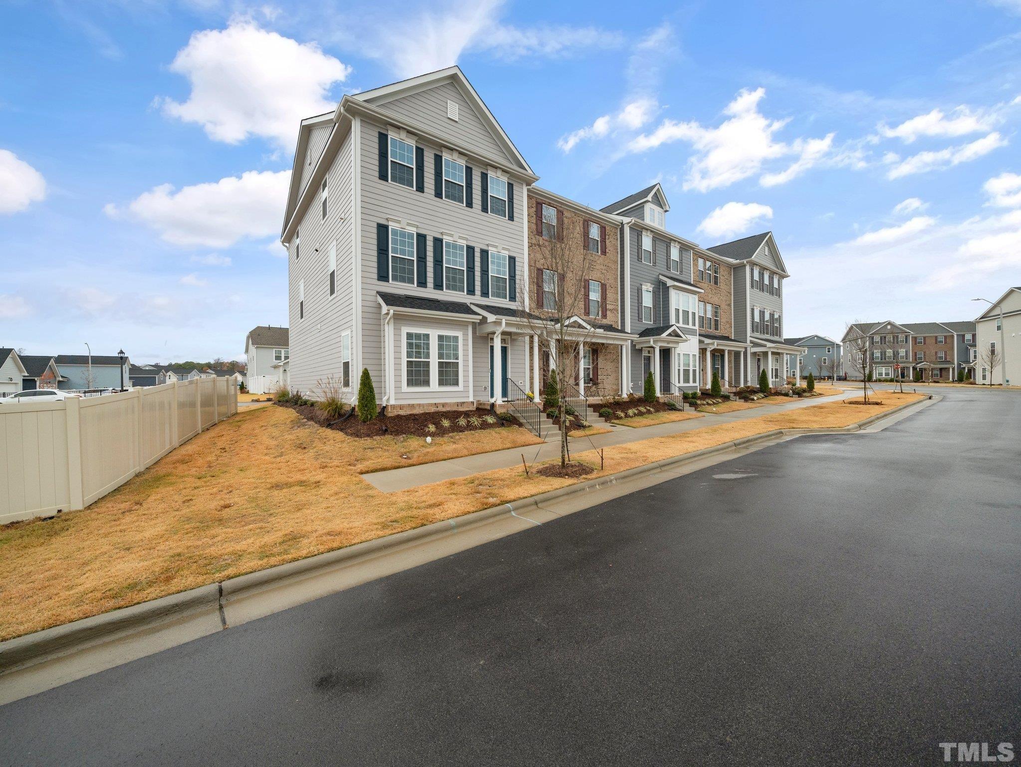 5915 Kayton Street Raleigh, NC 27616 - Photo 26 of 26 a view of a building with mountains