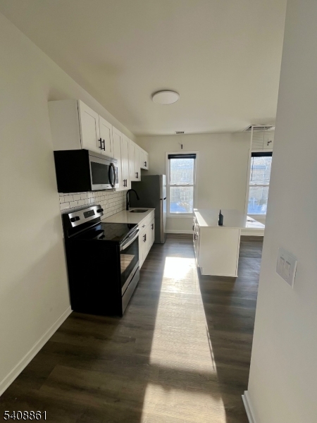 53 High Street, Unit A Newton, NJ 07860 - Photo 3 of 13 a view of kitchen with sink and refrigerator