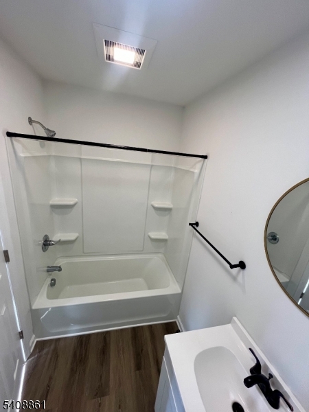 53 High Street, Unit A Newton, NJ 07860 - Photo 5 of 13 a bathroom with a sink and a mirror