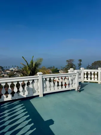 a view of a deck with a yard