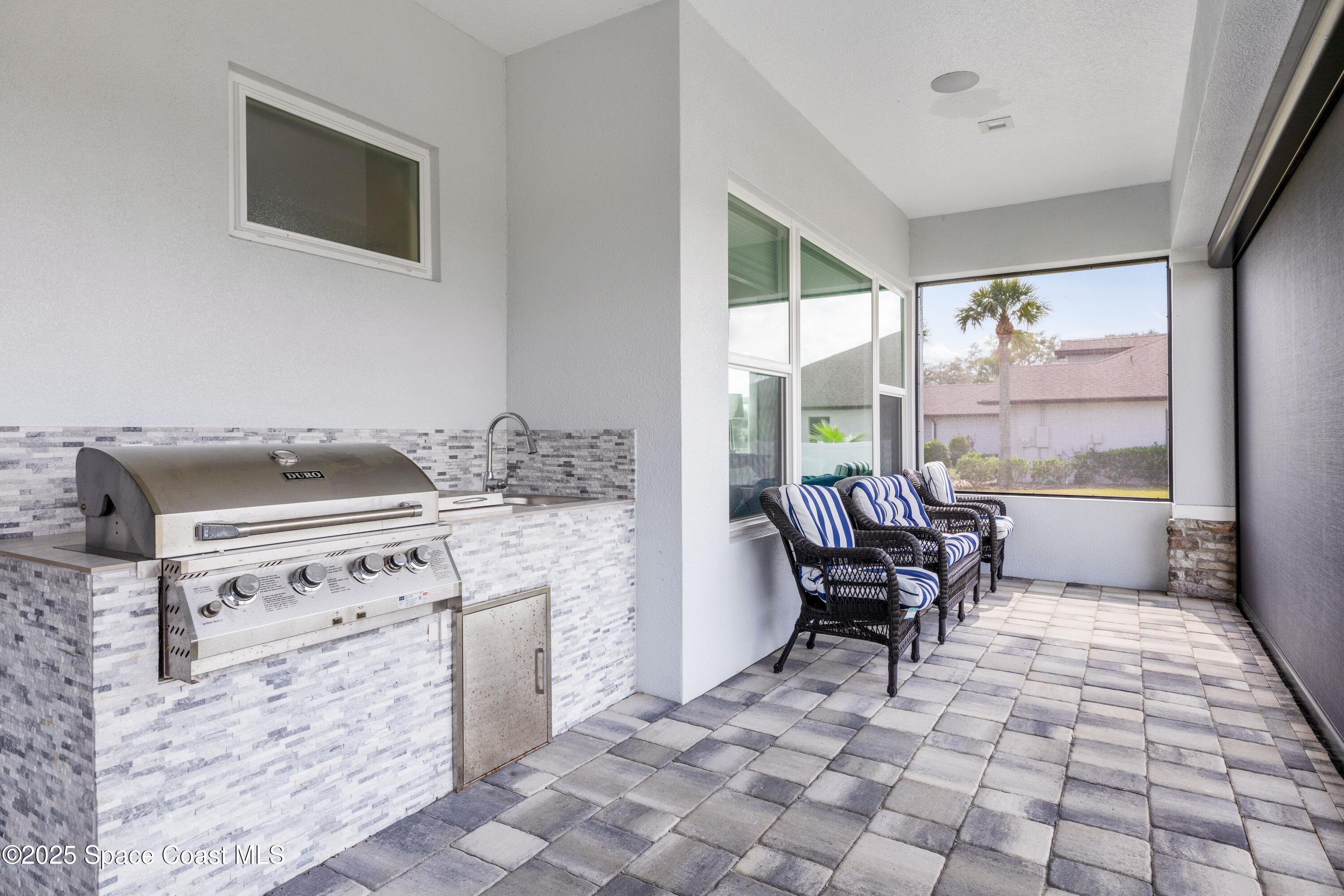 1420 Corey Road Malabar, FL 32950 - Photo 28 of 35 Outdoor Kitchen and Barbecue