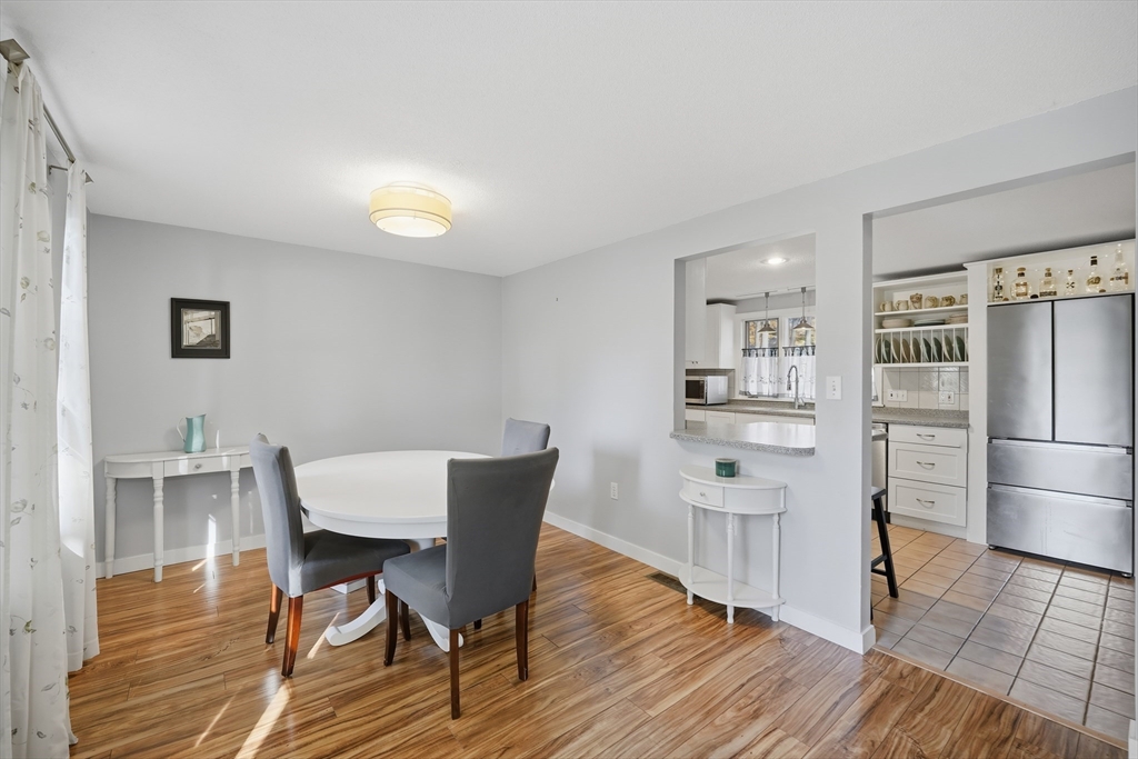 5 Ferncroft Street Longmeadow, MA 01106 - Photo 11 of 40 a view of a dining room with furniture and wooden floor