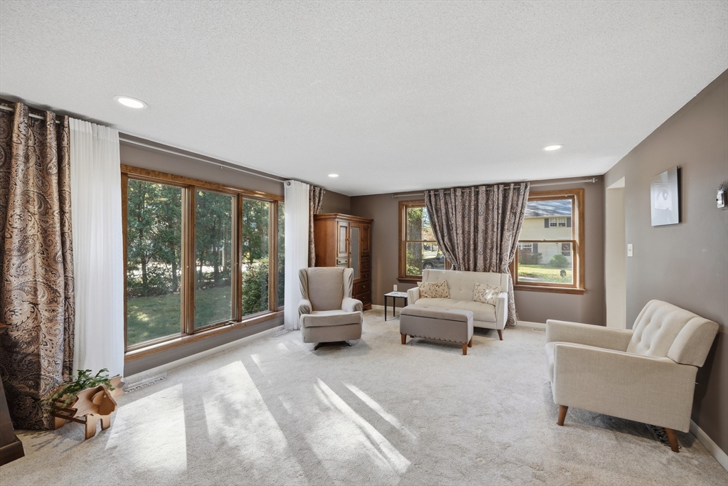 5 Ferncroft Street Longmeadow, MA 01106 - Photo 18 of 40 a living room with furniture and large windows