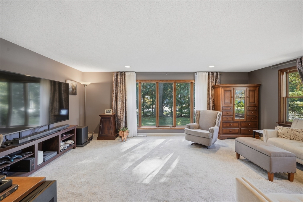 5 Ferncroft Street Longmeadow, MA 01106 - Photo 19 of 40 a living room with furniture and a flat screen tv