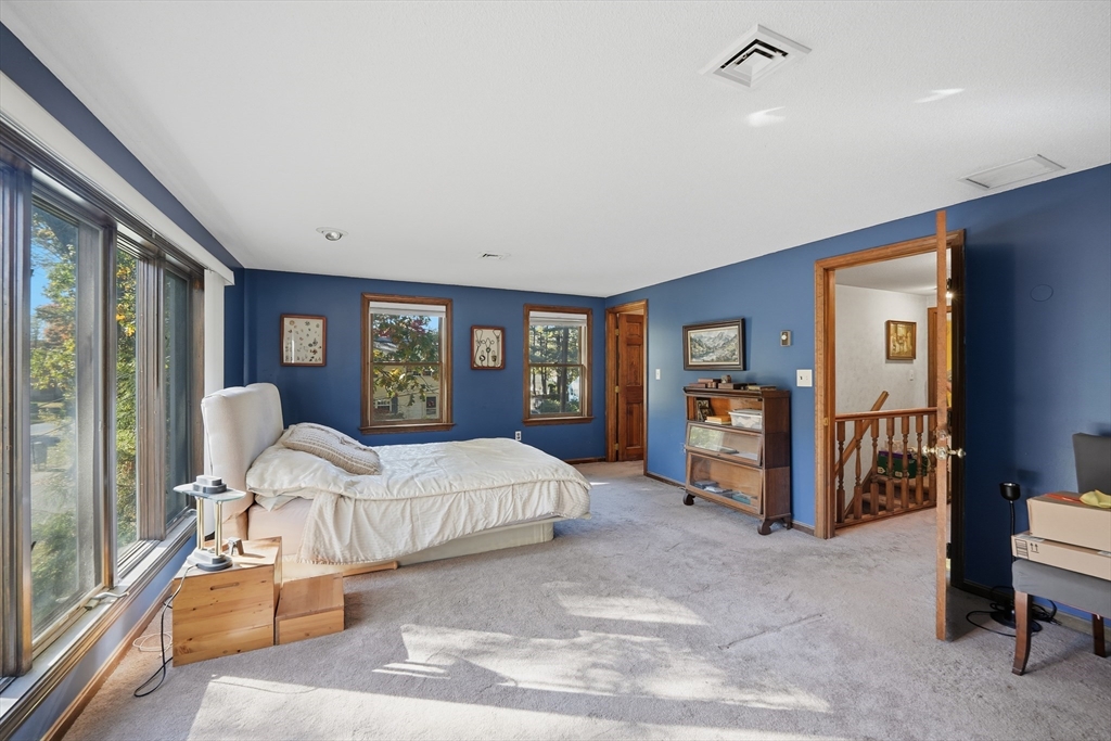 5 Ferncroft Street Longmeadow, MA 01106 - Photo 22 of 40 a bedroom with a large bed and a window