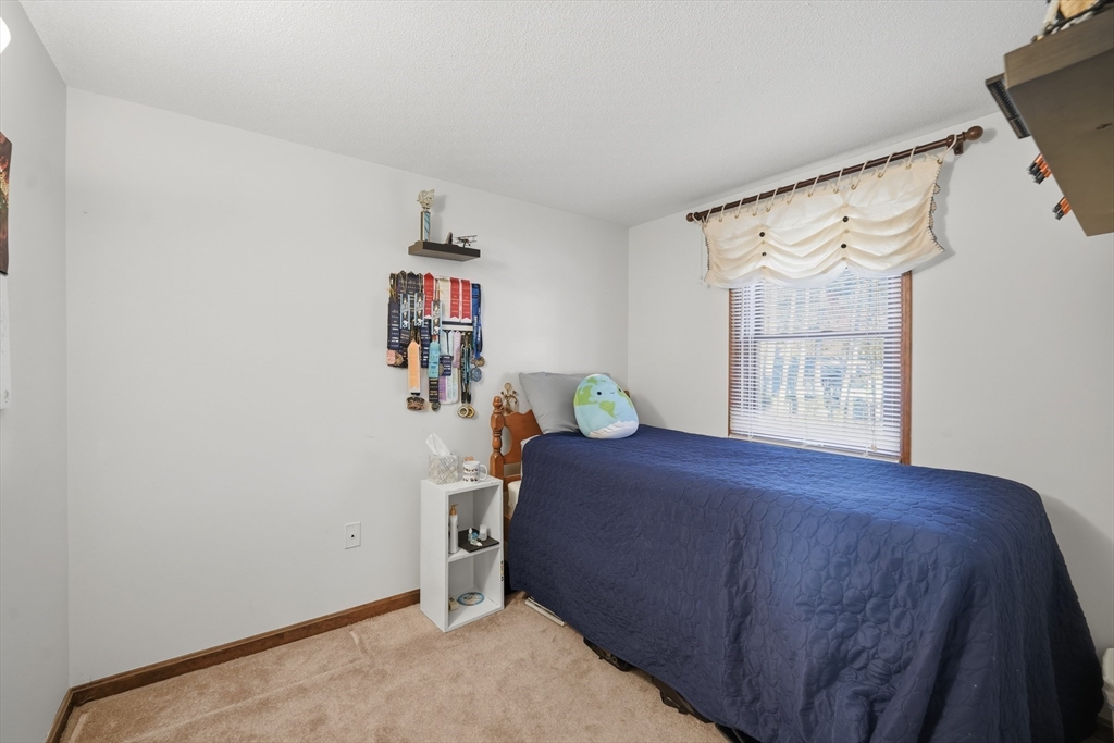 5 Ferncroft Street Longmeadow, MA 01106 - Photo 30 of 40 a bedroom with a bed and a window