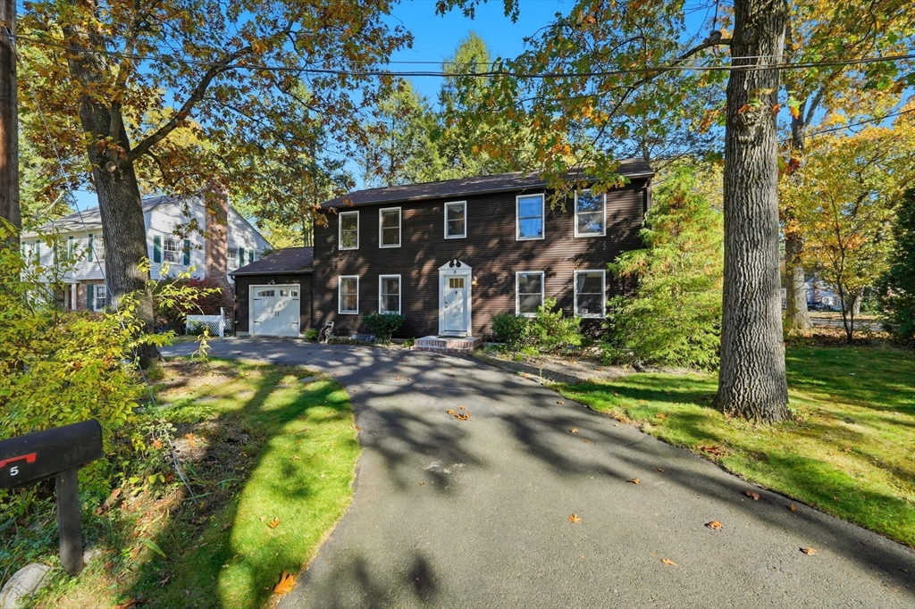 5 Ferncroft Street Longmeadow, MA 01106 - Photo 3 of 40 a front view of a house with a yard