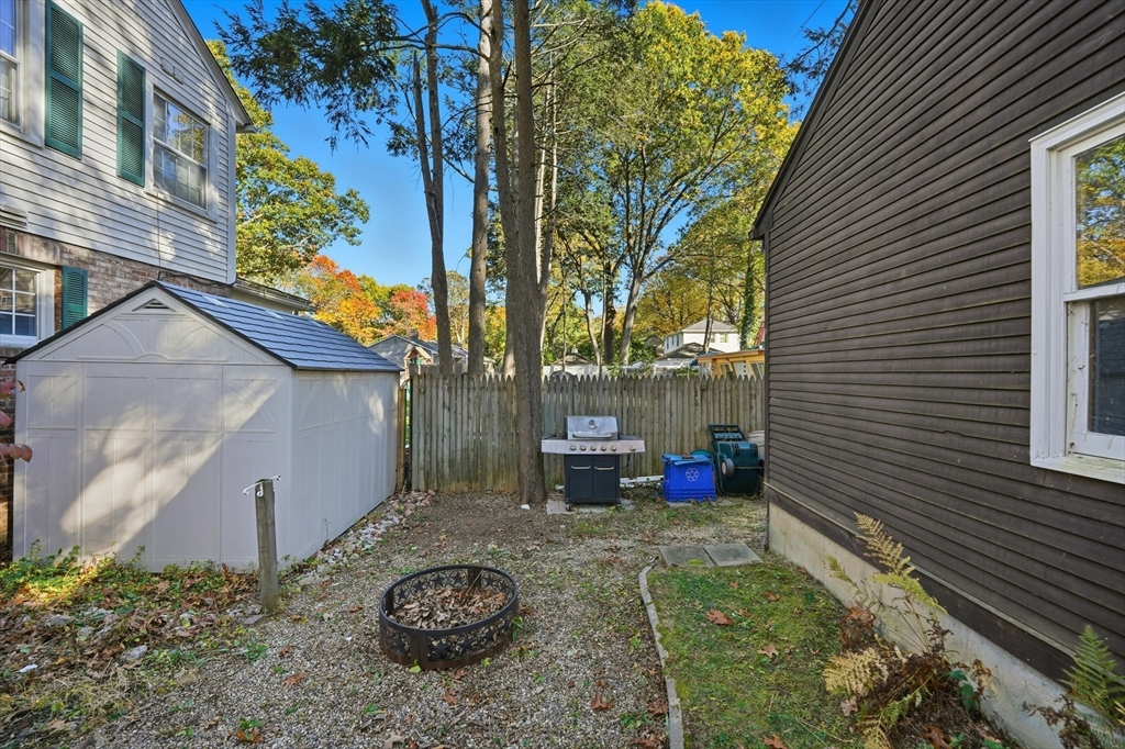 5 Ferncroft Street Longmeadow, MA 01106 - Photo 35 of 40 a view of backyard with table and chairs and potted plants