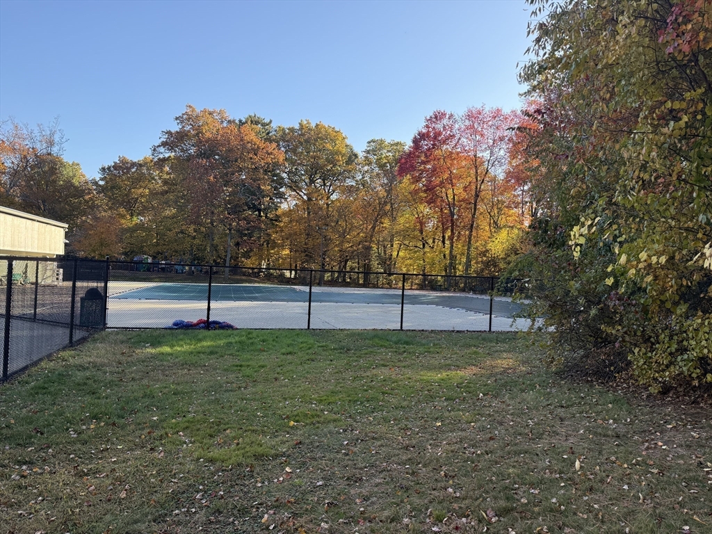 5 Ferncroft Street Longmeadow, MA 01106 - Photo 39 of 40 a view of a yard with wooden fence