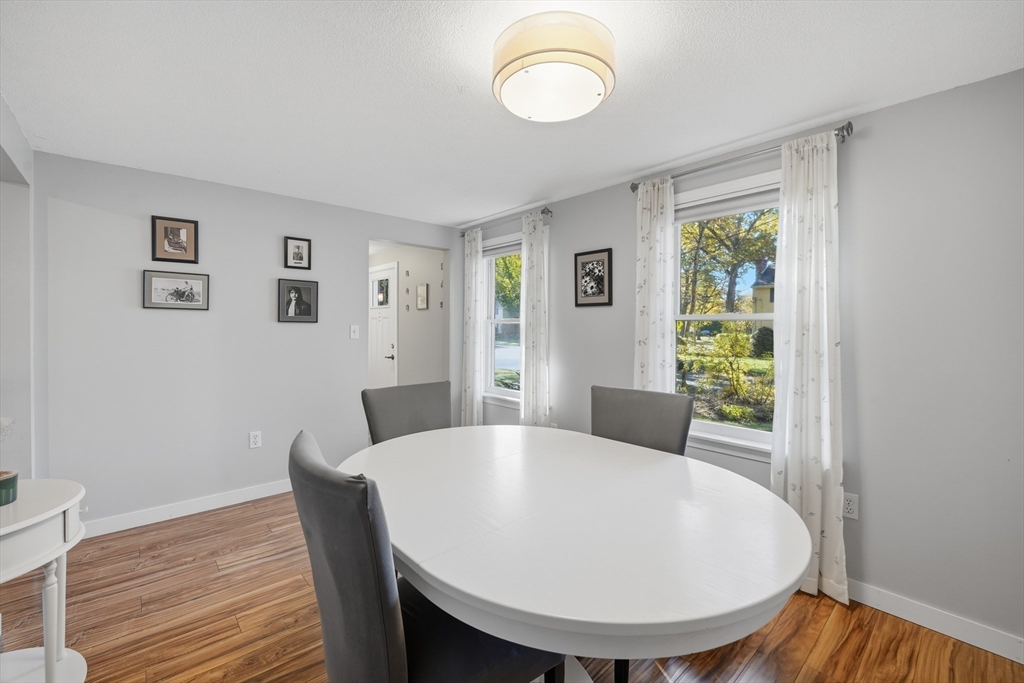 5 Ferncroft Street Longmeadow, MA 01106 - Photo 9 of 40 a view of a dining room with furniture window and wooden floor