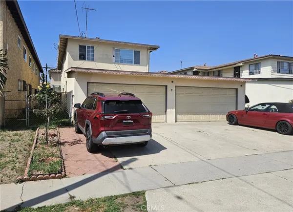 a car parked in front of a house