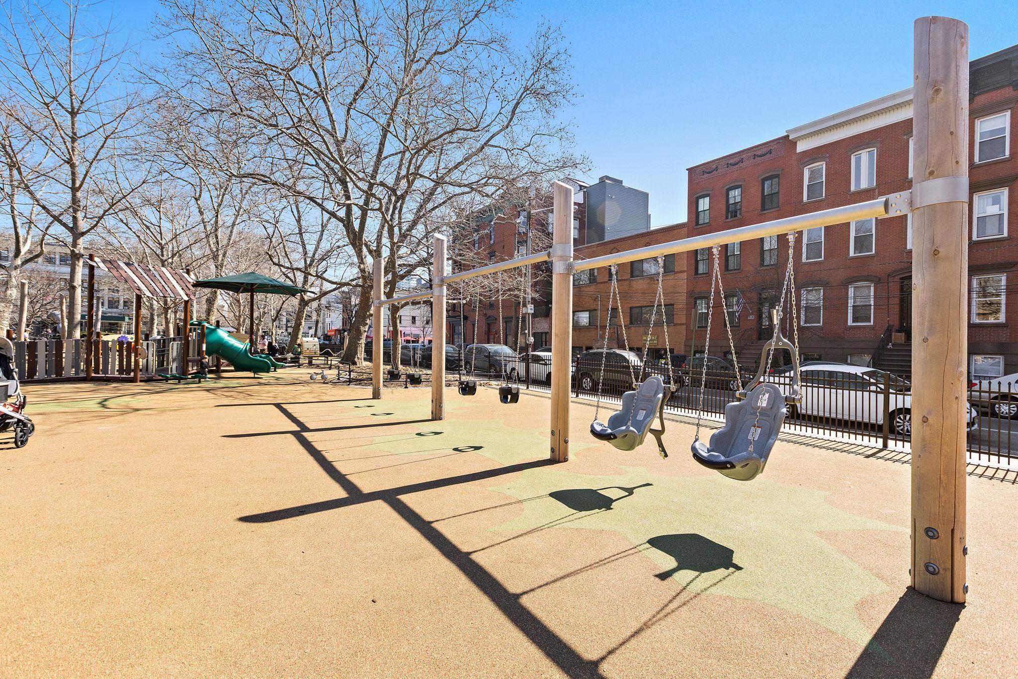 259 4th Street, Unit 2 Hoboken, NJ 07030 - Photo 19 of 20 a view of a building with snow on the road