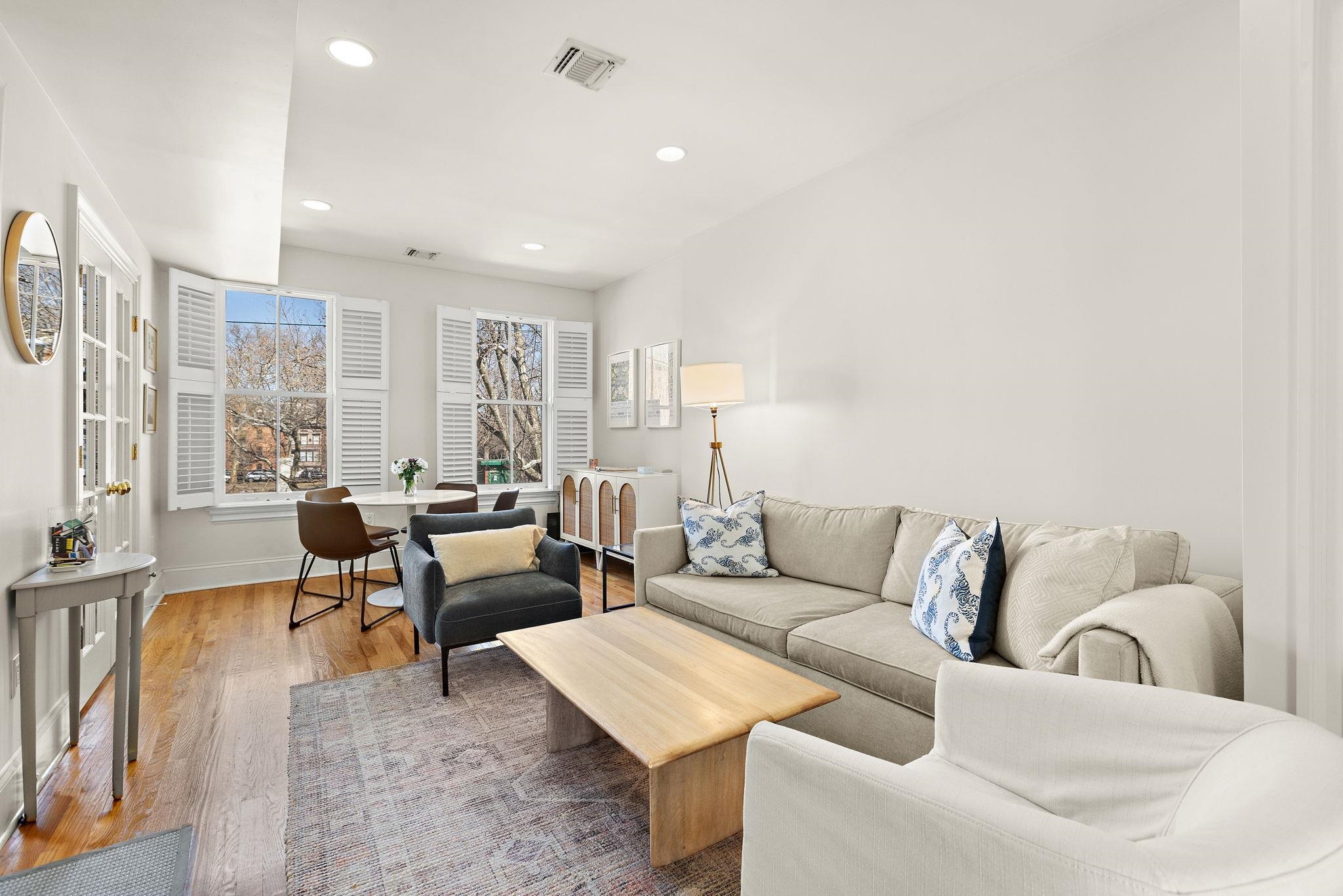 259 4th Street, Unit 2 Hoboken, NJ 07030 - Photo 2 of 20 a living room with furniture and a large window