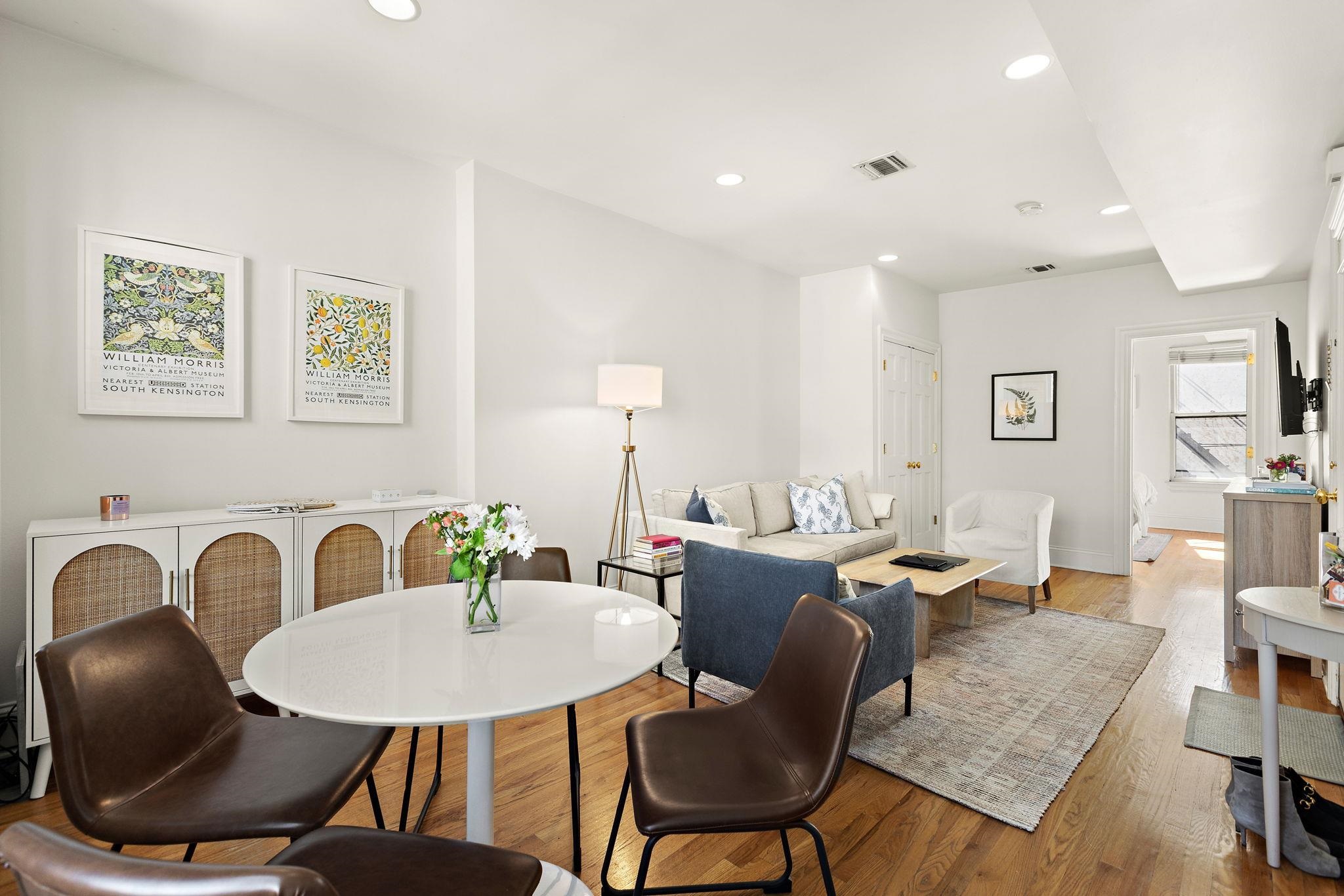 259 4th Street, Unit 2 Hoboken, NJ 07030 - Photo 6 of 20 a view of a dining room with furniture