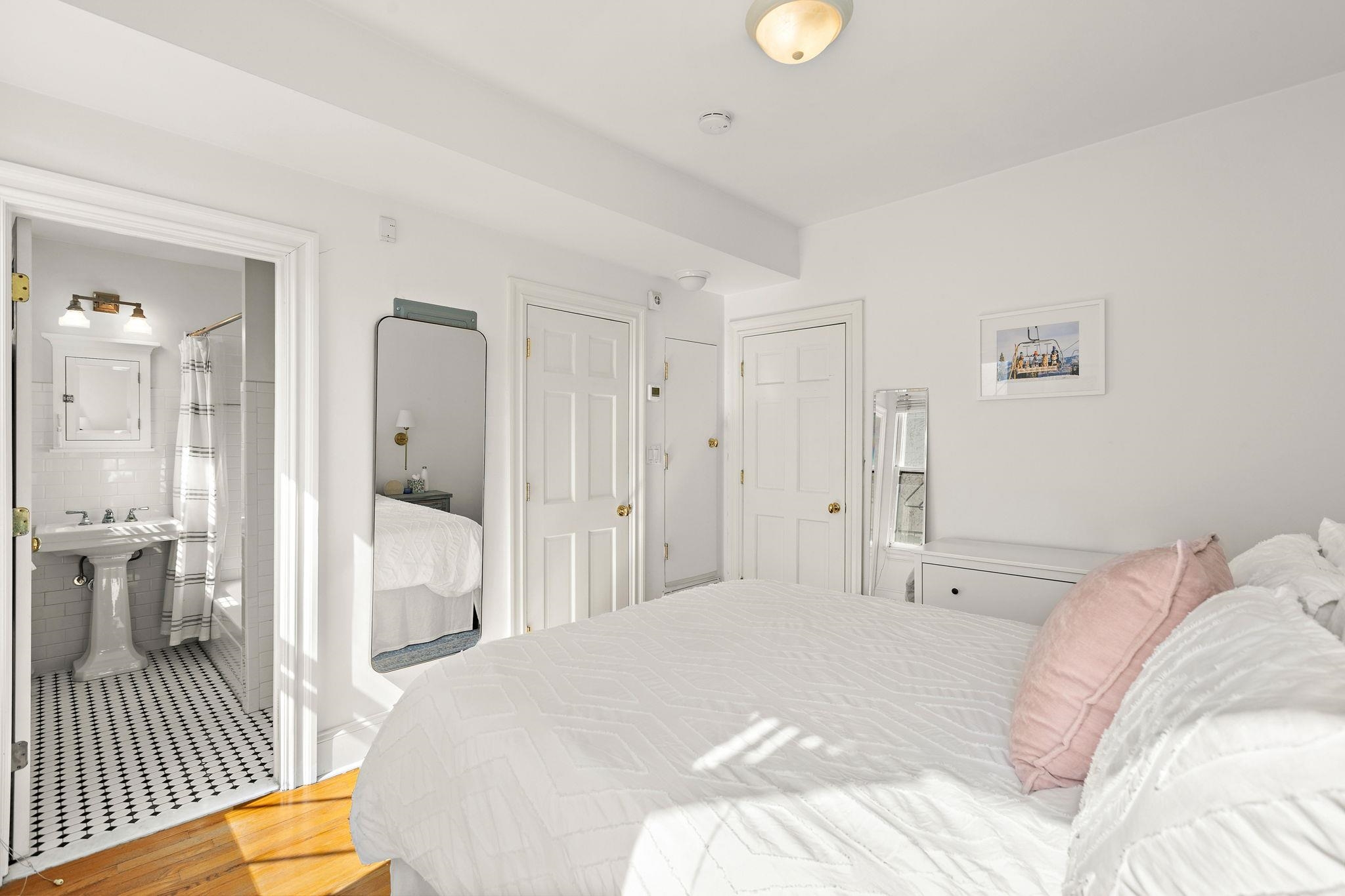 259 4th Street, Unit 2 Hoboken, NJ 07030 - Photo 9 of 20 a bedroom with a bed and glass door