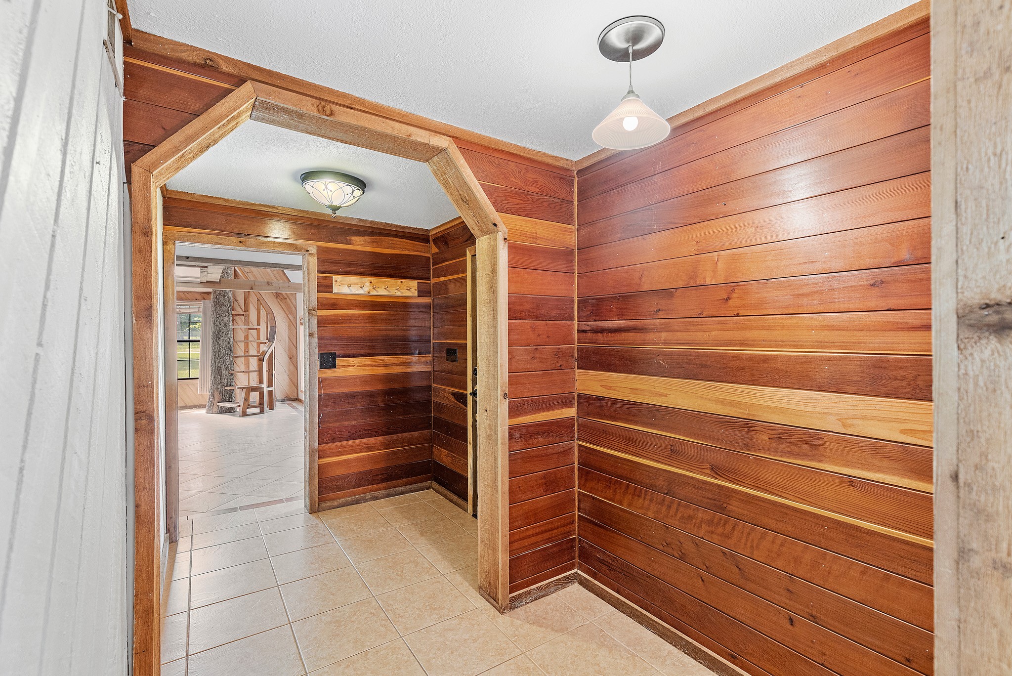 230 Walnut Drive Trinity, TX 75862 - Photo 3 of 48 Step through the formal entry and into a beautifully designed living space that exudes character and charm