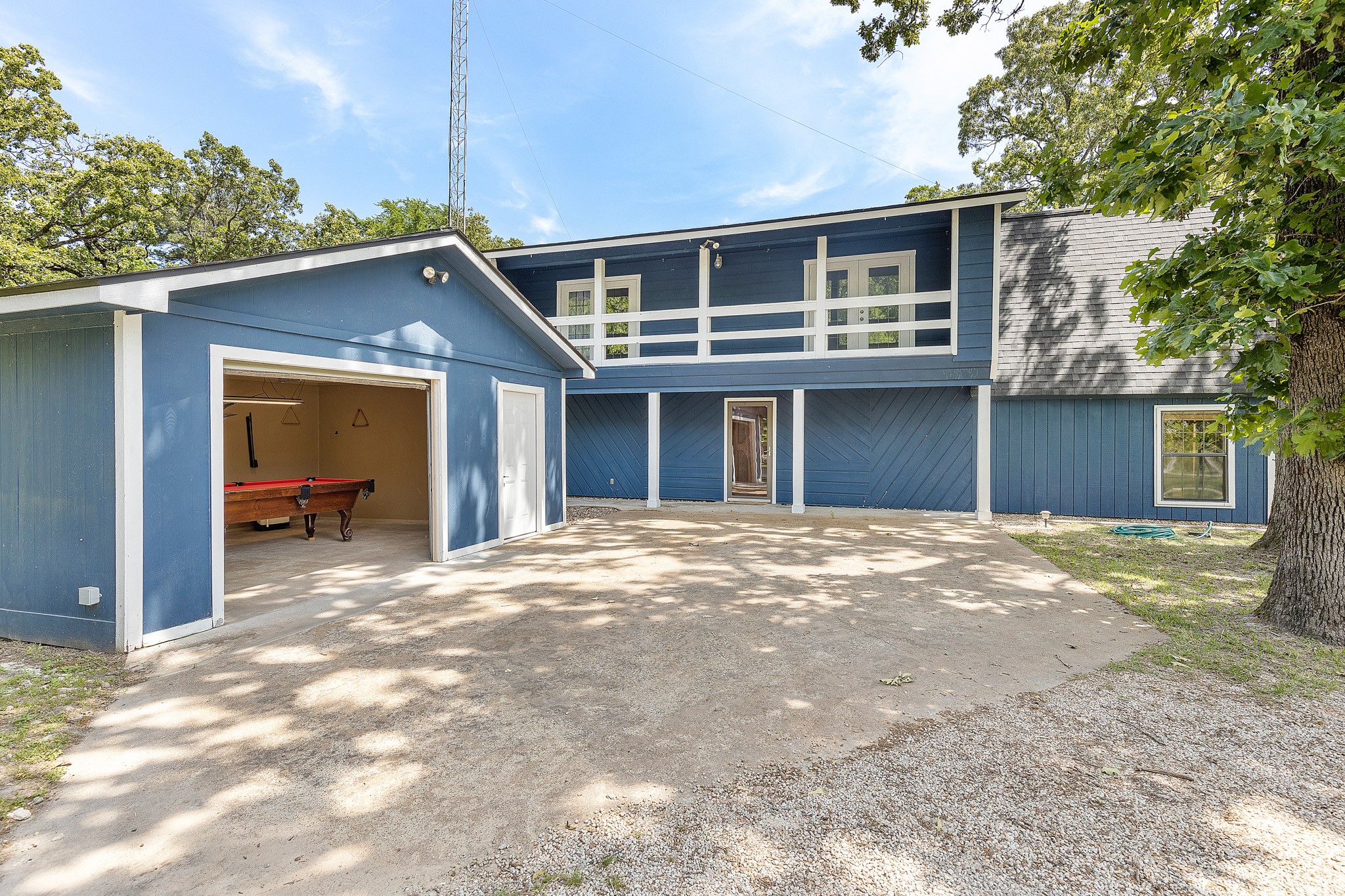 230 Walnut Drive Trinity, TX 75862 - Photo 39 of 48 View of the garage and house from the covered parking area